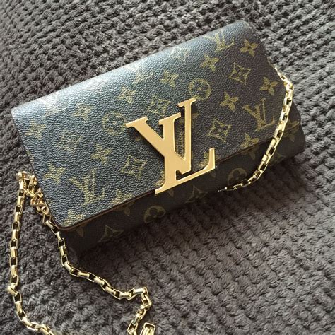 lv women clutch|lv clutch price.